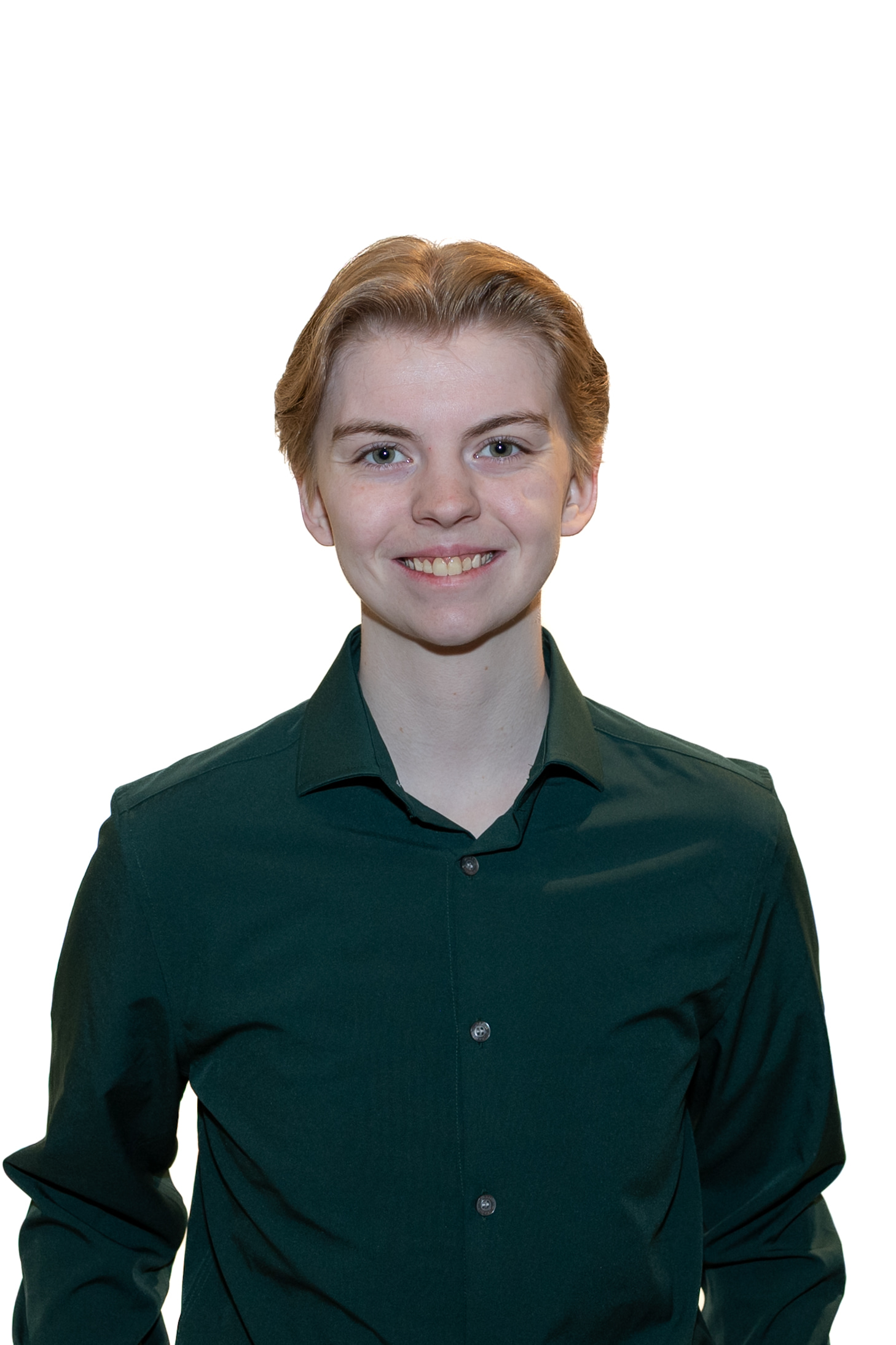 Head of Finance, Piper Gaff, wearing a dark green button up and smiling